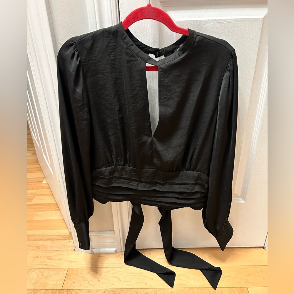 Dynamite blouse in size large. Bow to tie in the back. Semi crop top.